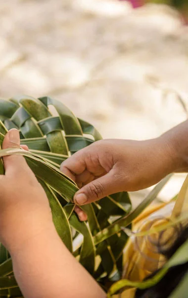 Braiding workshop in The Islands of Tahiti © Myles McGuinness